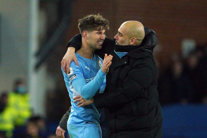 Pep Guardiola And John Stones