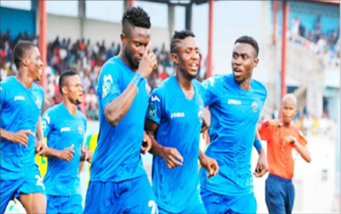 Enyimba Fc Players Celebrating A Goal