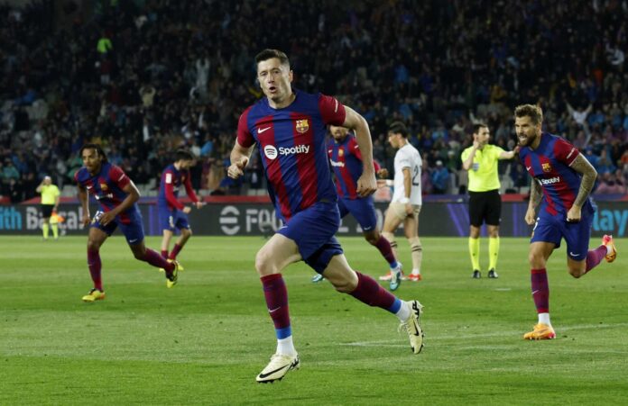 Robert Lewandowski Scoring A Hat Trick For Fc Barcelona