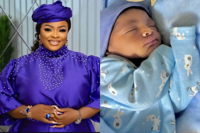 Dayo Amusa With Her Baby