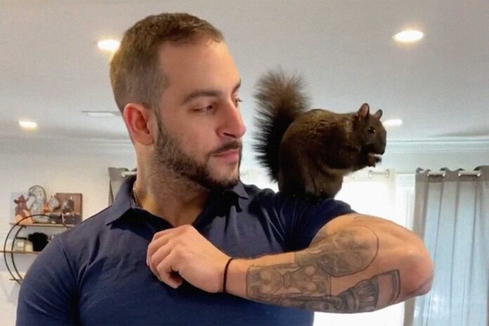 Peanut The Squirrel And Mark Longo