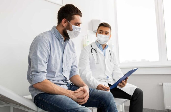 Urologists Examining Male Patients For Erectile Dysfunction