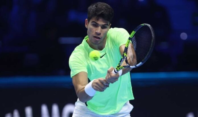 Carlos Alcaraz Playing Tennis At Wimbledon