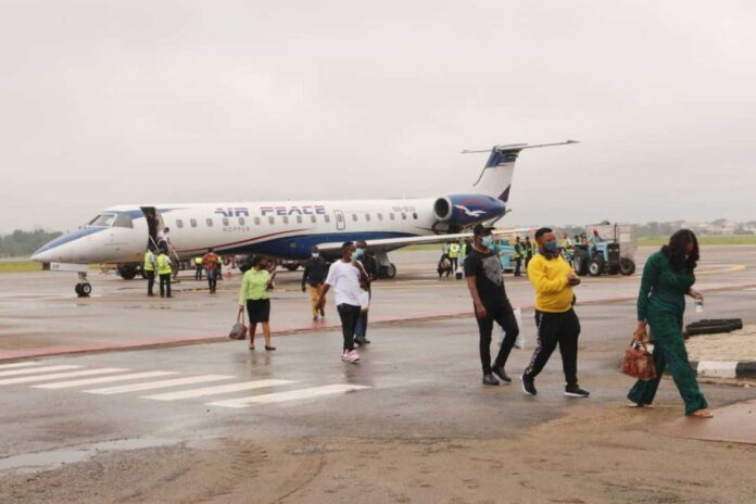 Enugu Air Aircraft With Passengers Boarding