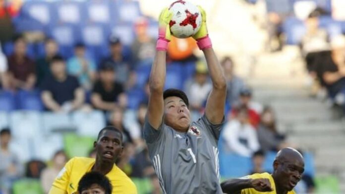 Fc Tokyo Players In Action During Match
