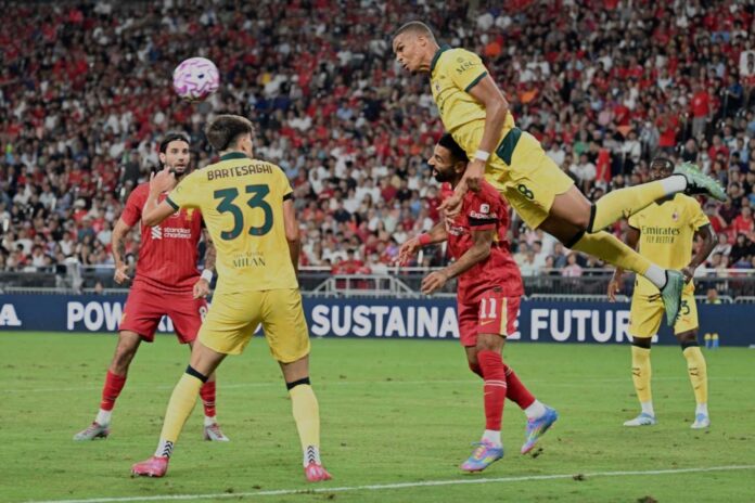 Liverpool And Ac Milan Players In Action