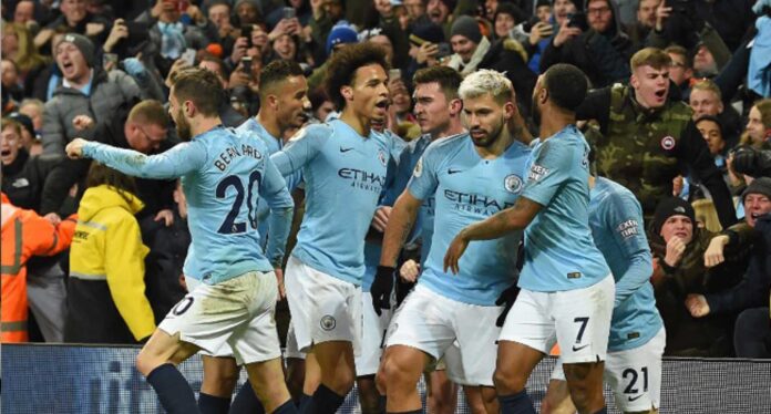 Manchester City Players Celebrating After A Goal