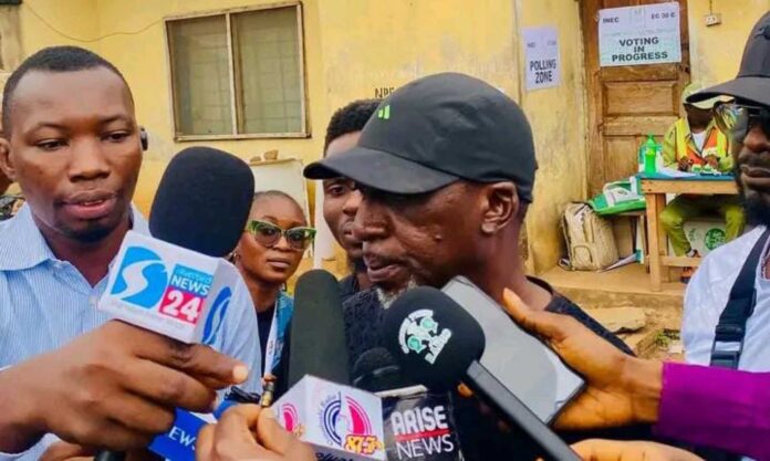 Olatunji Adewale Voting In Ibadan
