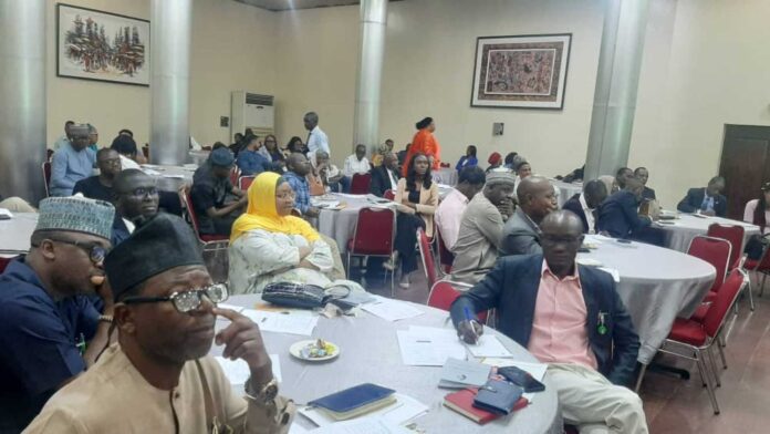 Pension Commission Building And Representatives Discussing Recovery