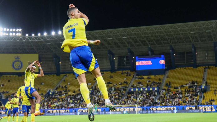 Al Nassr Players Celebrating A Goal