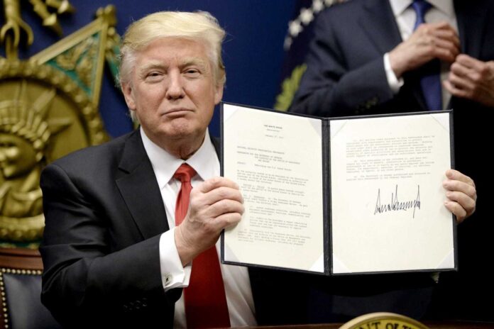 Donald Trump Signing Immigration Policy