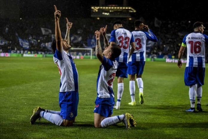 Fc Porto Players Celebrating A Goal