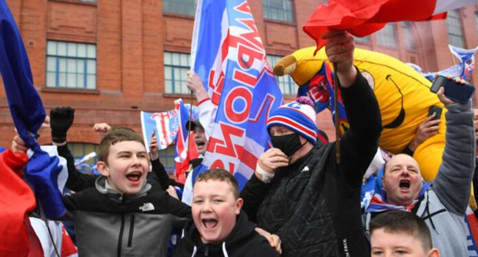 Scottish Football Fans With Local Protests