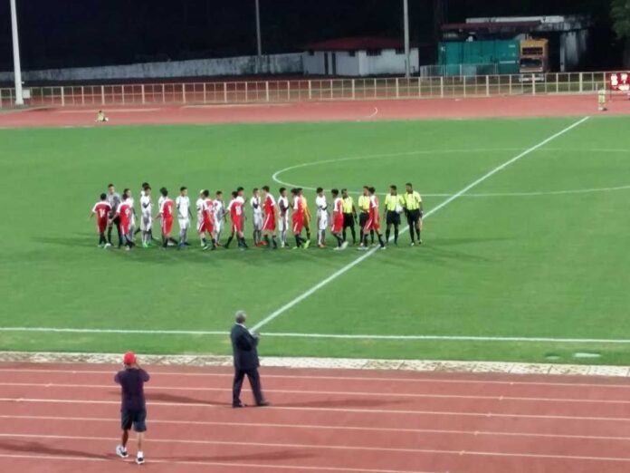 Indian And Singaporean Football Teams In Action