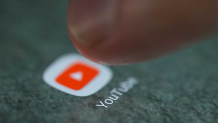 Youtube Logo And Mobile Phone Screen