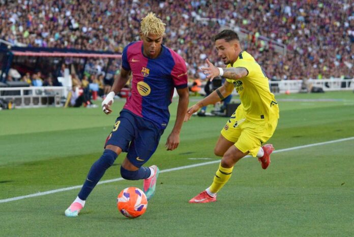Barcelona Football Team In Action During Match