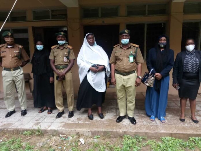 Nigerian Correctional Service Employees With Inmates