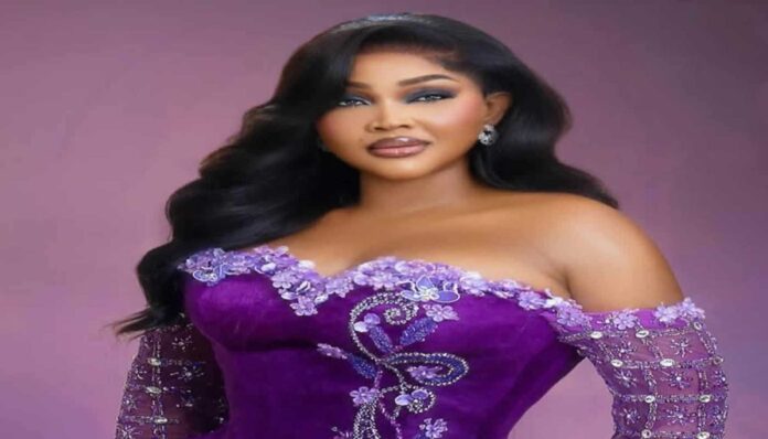 Mercy Aigbe Vine Olugu Kissing