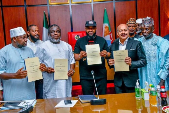 Niger State Governor Umaru Bago Signing Agreement