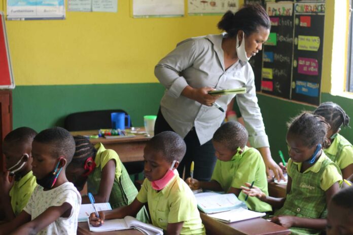 Nigerian Children Studying In Classroom