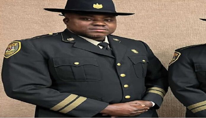 Nigerian Police Officer Monday Alade