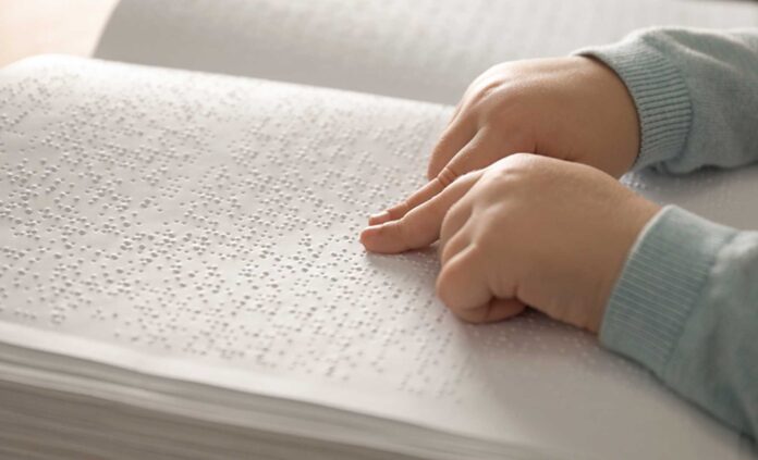 Visually Impaired Learners Reading Braille Books