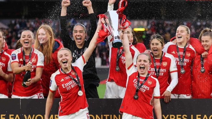 Arsenal Women's Team Celebrating A Goal