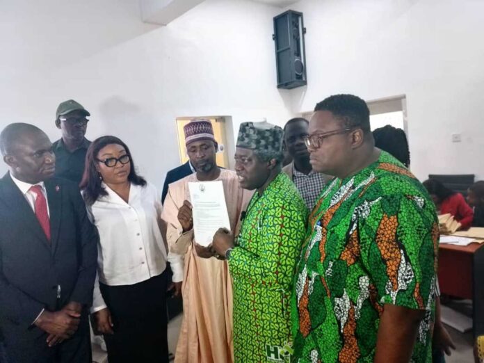 Traders Receiving Allocation Letters Alaba Market