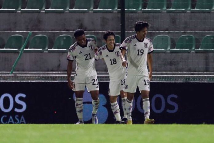 Japan Players Celebrate Goal Against England At Wembley