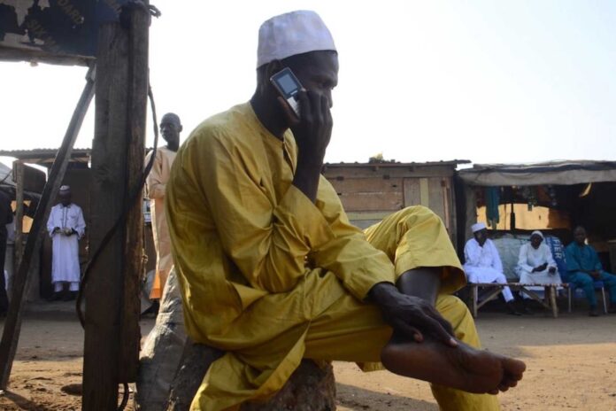 Nigerian Communications Commission Logo And Mobile Phones