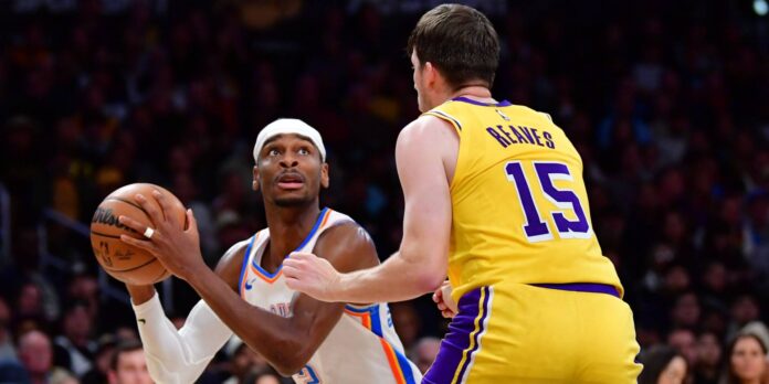 Shai Gilgeous Alexander Dunking Over Lakers